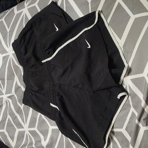 Two pairs of girls Nike